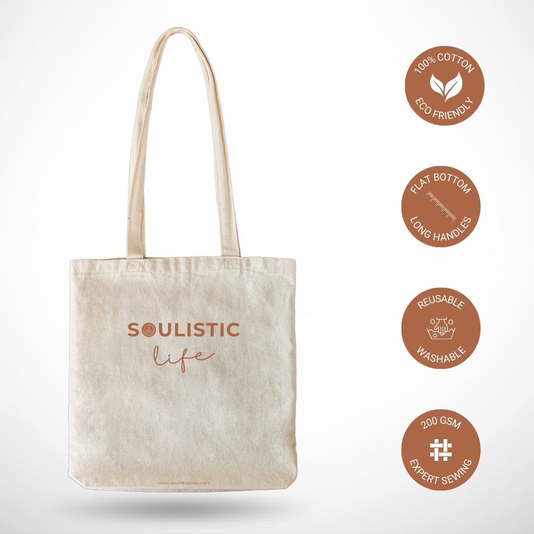 Beige tote bag with 'Soulistic Life' branding and eco-friendly features on a white background