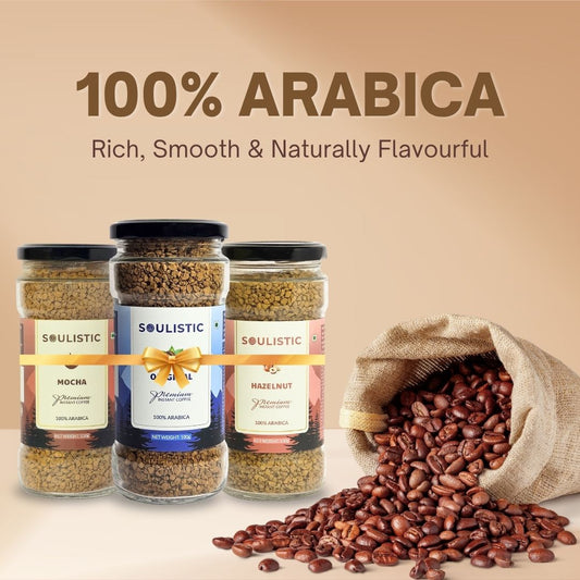 Three Soulistic Coffee Jars and a bag of coffee beans with '100% Arabica' text on a beige background
